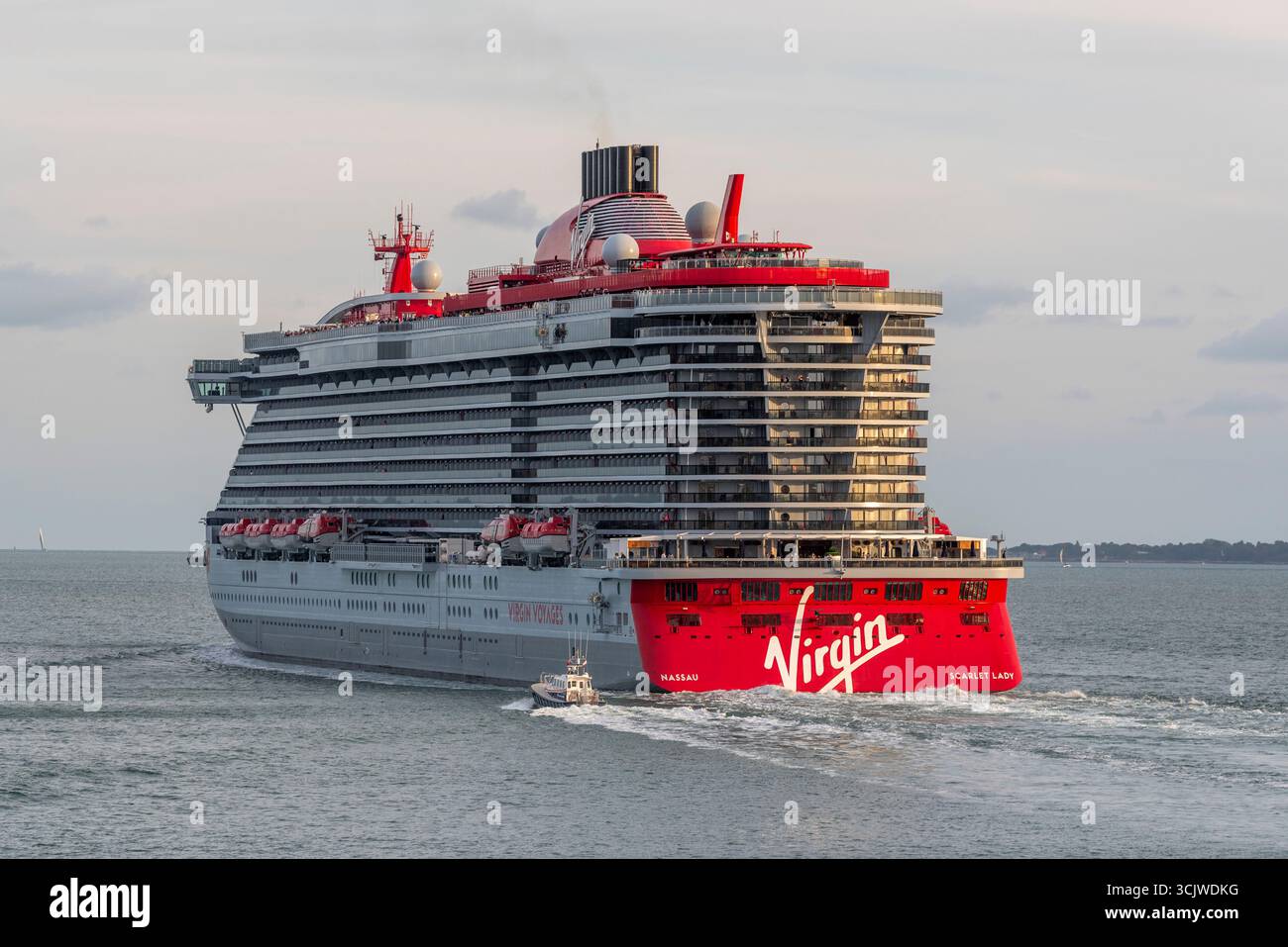 Portsmouth England UK.  The Scarlet Lady cruise ship outbound from Portsmouth ssoutherrn England UK. Stock Photo