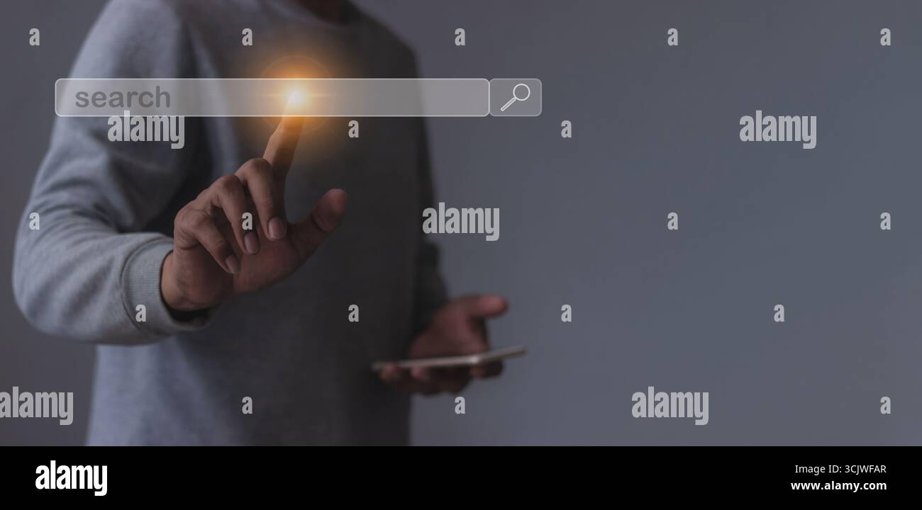 Young man with smartphone mobile hand touching search bar, Search job Stock Photo