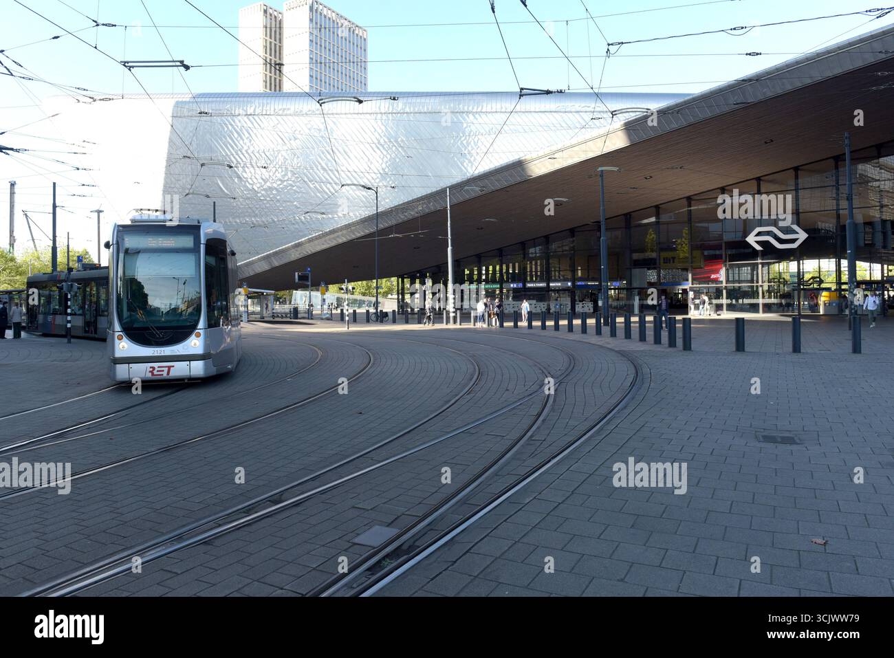 A tram passing the main entrance of Centraal Station, Rotterdam, Netherlands, August 2025 Stock Photo