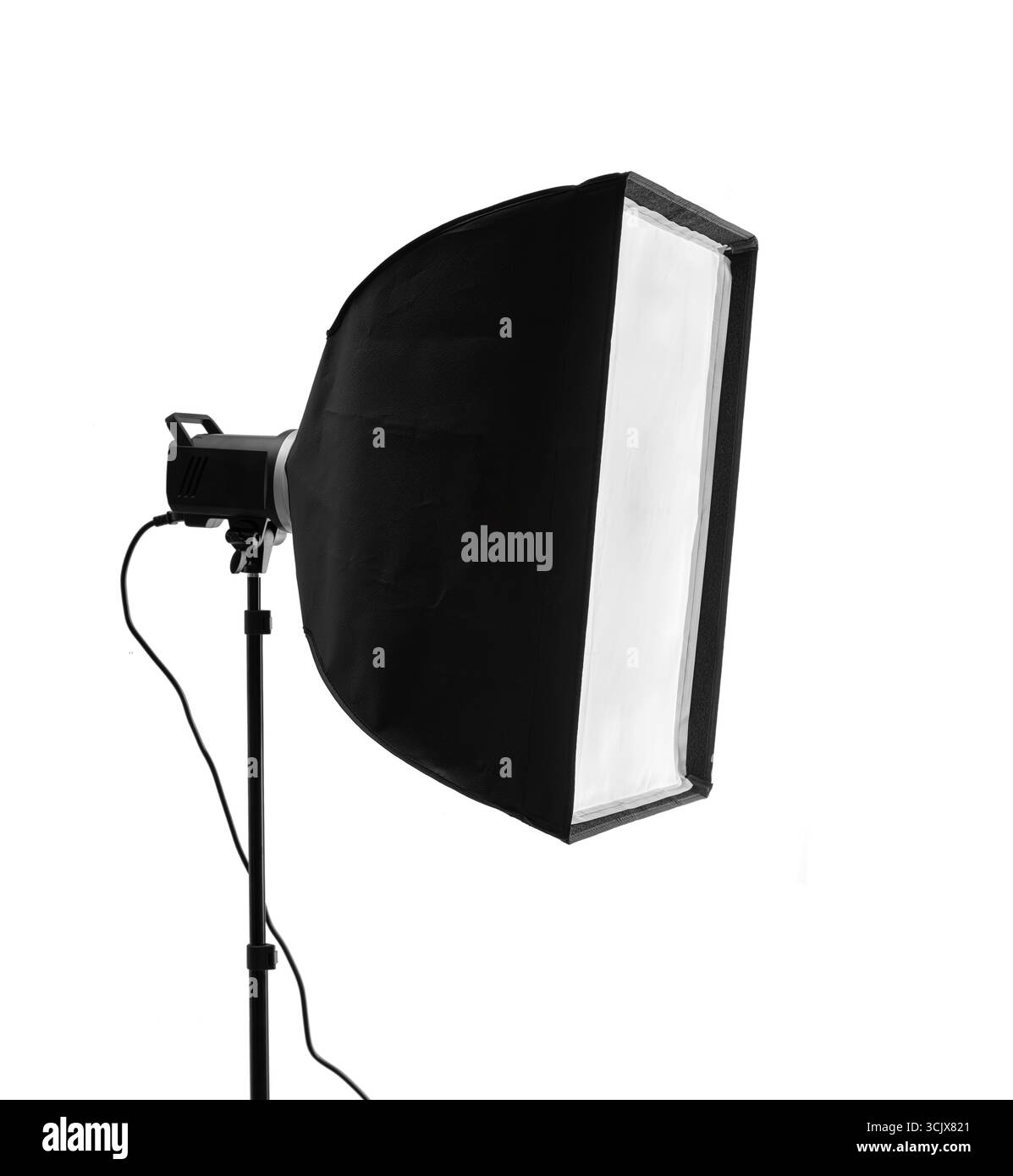 A professional photographic studio flash with a rectangular softbox mounted on a stand Stock Photo