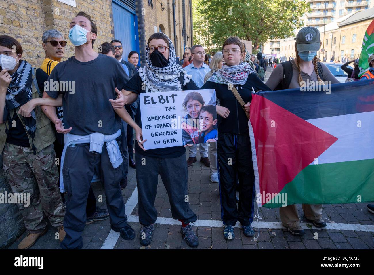 Demonstrators at a protest at the Defence and Security Equipment ...