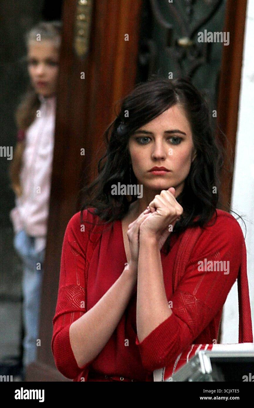 green emerald velvet dress Eva Green 8x10 Photo Casino Royale Penny Dreadful in Strappy Black Dress  Looking Over Righ Shoulder kn at Amazon's Entertainment Collectibles Store main image 0