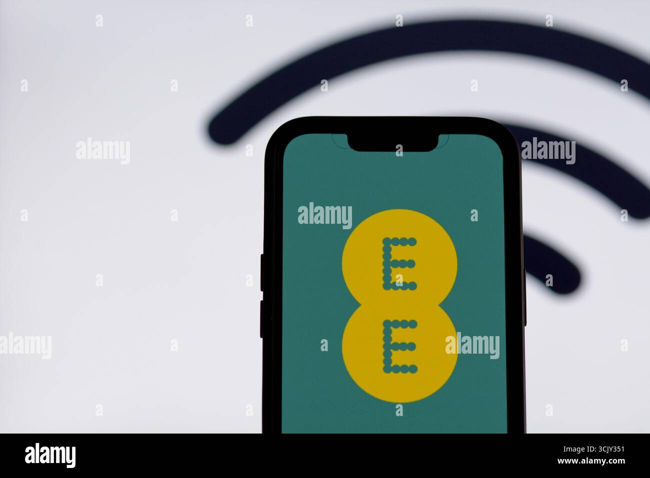EE app on smartphone screen Stock Photo