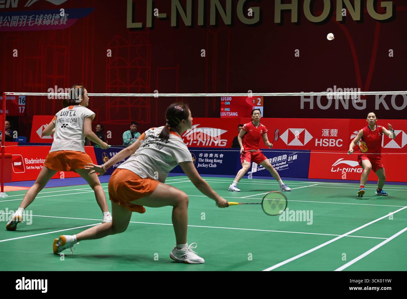 Li Yi Jing and Luo Xu Min of team China and Lui Lok Lok and Tsang Hiu ...