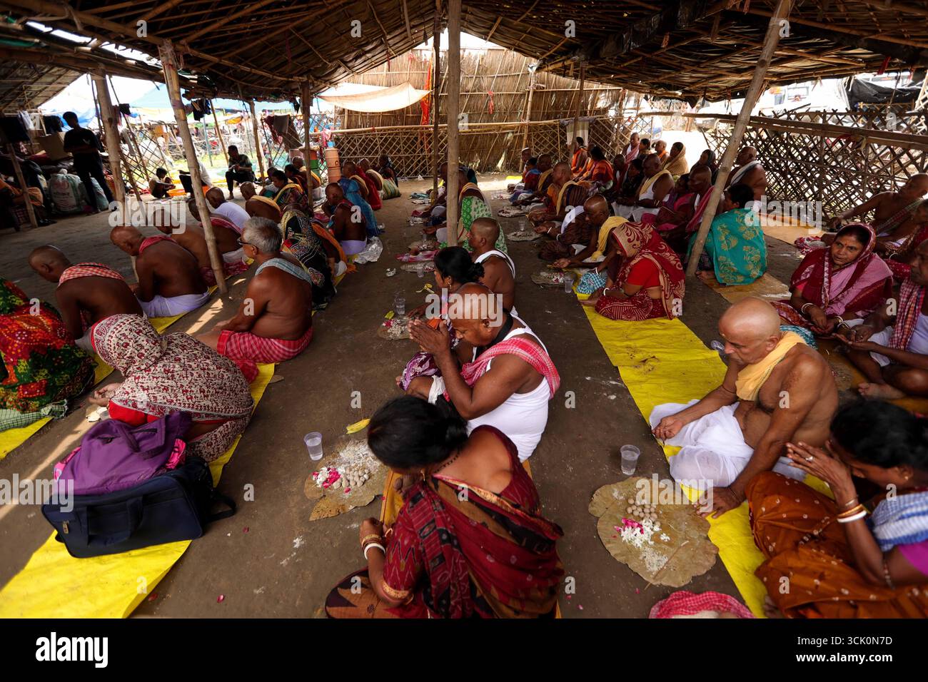 Prayagraj, India. 09 Sep. 2025, People perform rituals to pay homage to ...