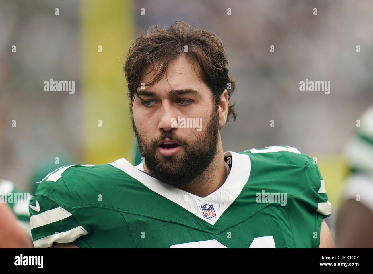 New York Jets offensive tackle Max Mitchell (61) on the sidelines ...