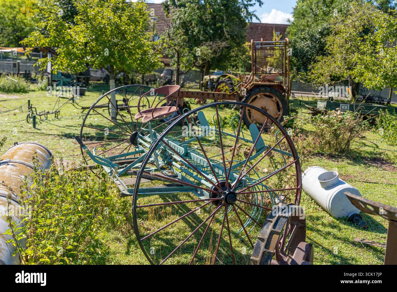 Vintage farm equipment rests hi-res stock photography and images - Alamy