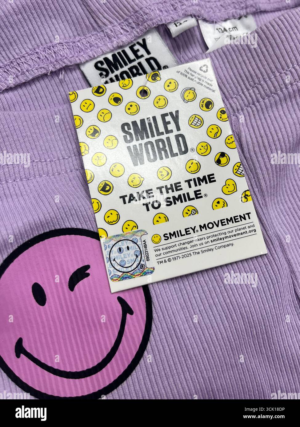 Smiley World children's clothing retail merchandise - Smartphone Captured Stock Image