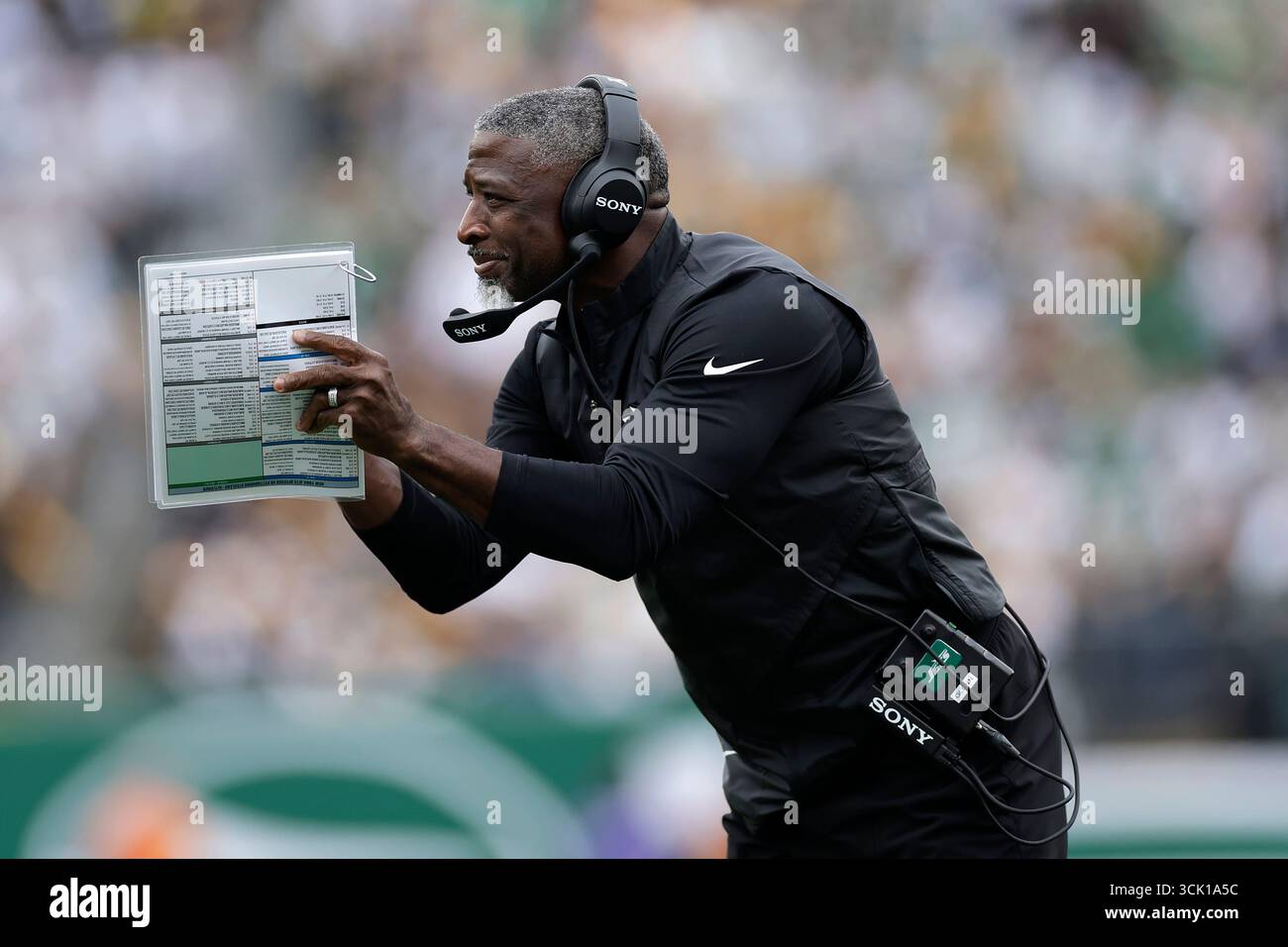 New York Jets head coach Aaron Glenn reacts during an NFL football game ...