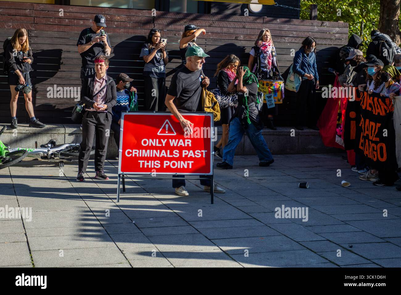 Hundreds of activists gathered outside the ExCeL Centre in London to ...