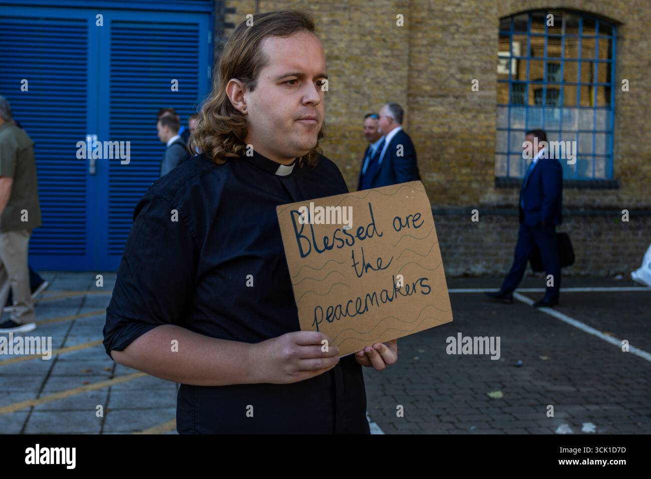 Hundreds of activists gathered outside the ExCeL Centre in London to ...
