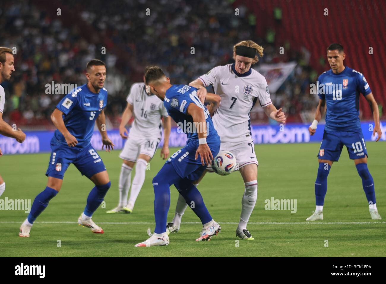 England s Anthony Gordon Second Right Duels For The Ball With Serbia england-s-anthony-gordon-second-right-duels-for-the-ball-with-serbia