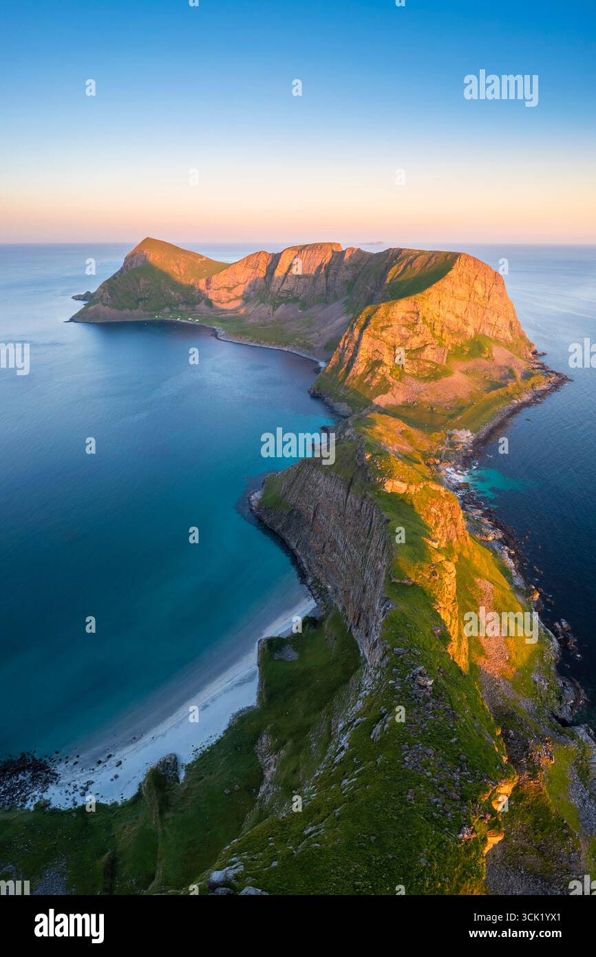 Aerial view of the rocky peaks and beaches of the island of Vaeroy. Sorland, Vaeroy, Nordland, Lofoten, Norway, Europe. Stock Photo