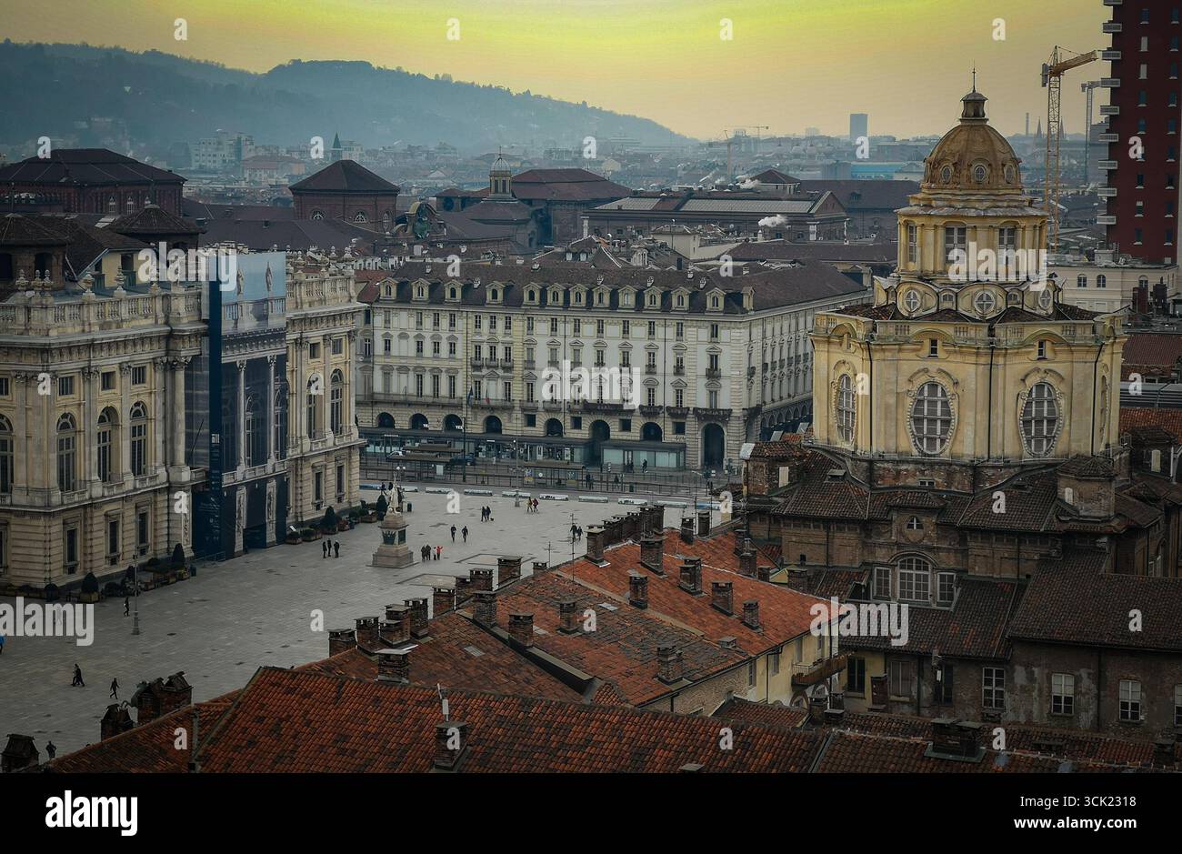 An elevated view of the grand Piazza Castello, the central square of Turin, Italy. The photo captures the historic heart of the city, with its wide pl - Smartphone Captured Stock Image