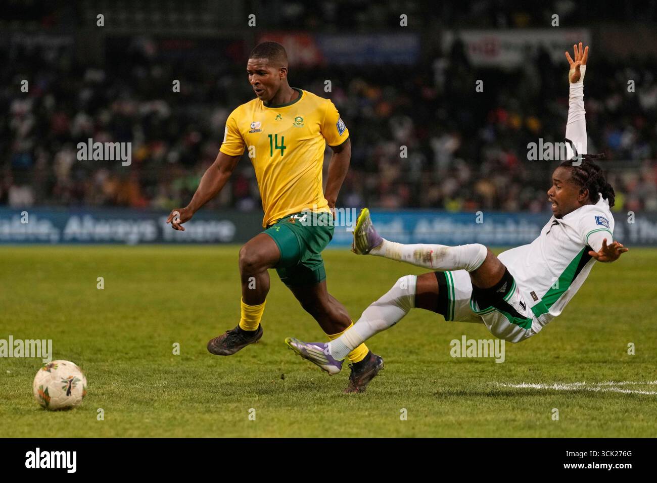 south-africa-s-mbikezeli-mbokazi-left-defends-the-ball-against