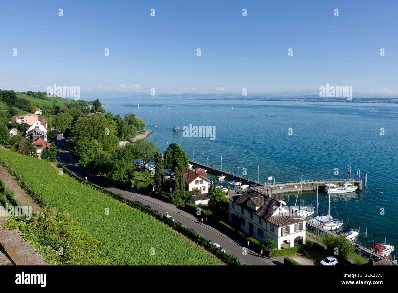 Meersburg: View from the terrace of the state winery overlooking Lake Constance and the boat landing stage, Baden-Württemberg, Germany Stock Photo