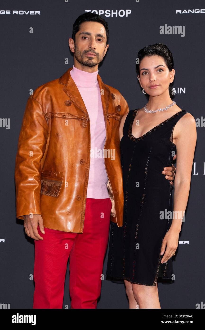 Riz Ahmed, left, and Fatima Farheen Mirza pose for photographers upon ...