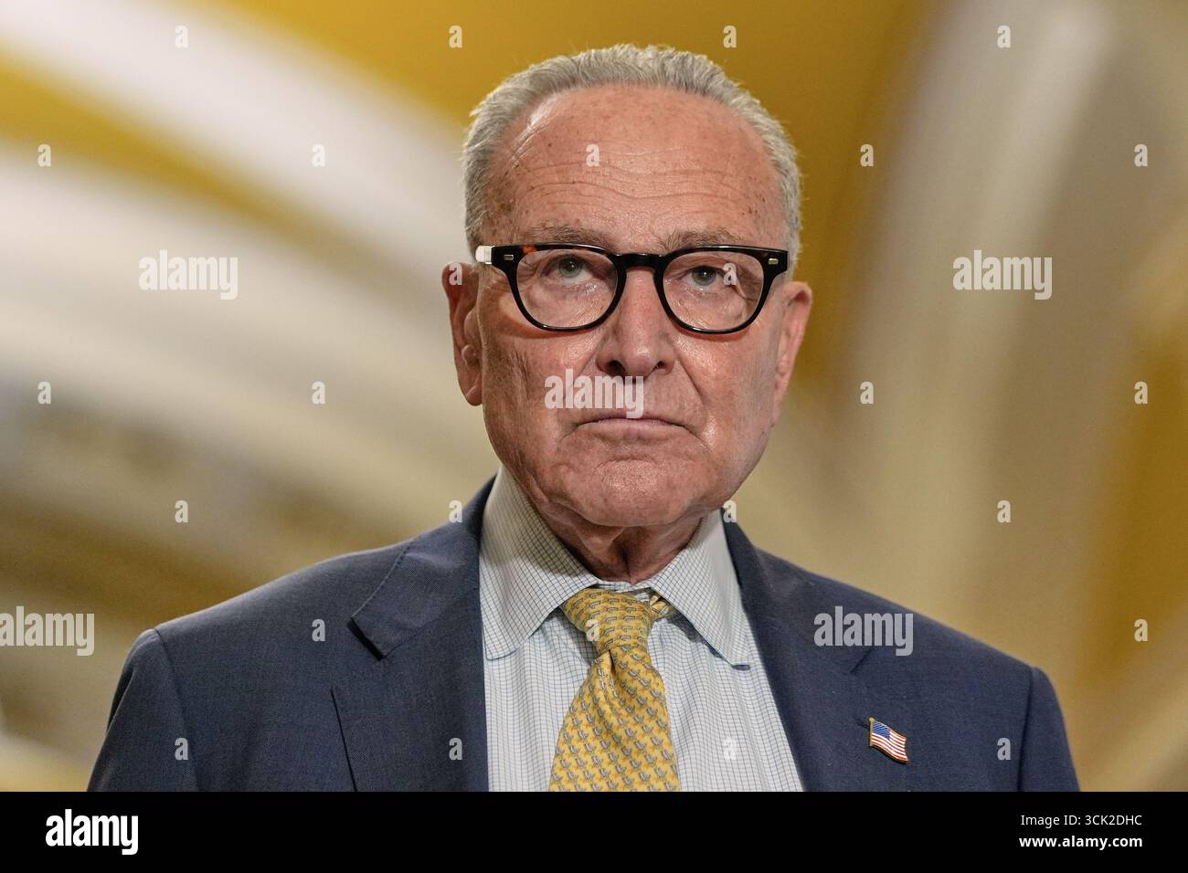 Senate Minority Leader Chuck Schumer of N.Y., listens during a news ...