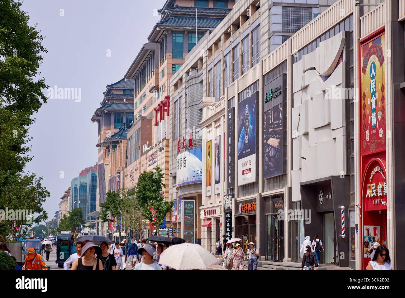 Street scene in Wangfujing Street in downtown Beijing, famous for its modern and trendy shopping malls Stock Photo