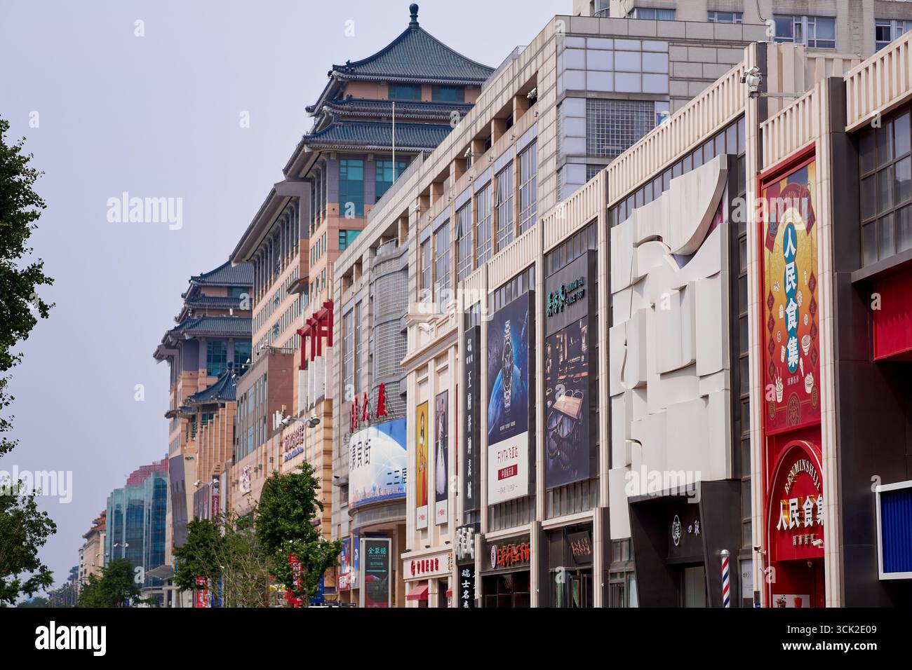 Street scene in Wangfujing Street in downtown Beijing, famous for its modern and trendy shopping malls Stock Photo