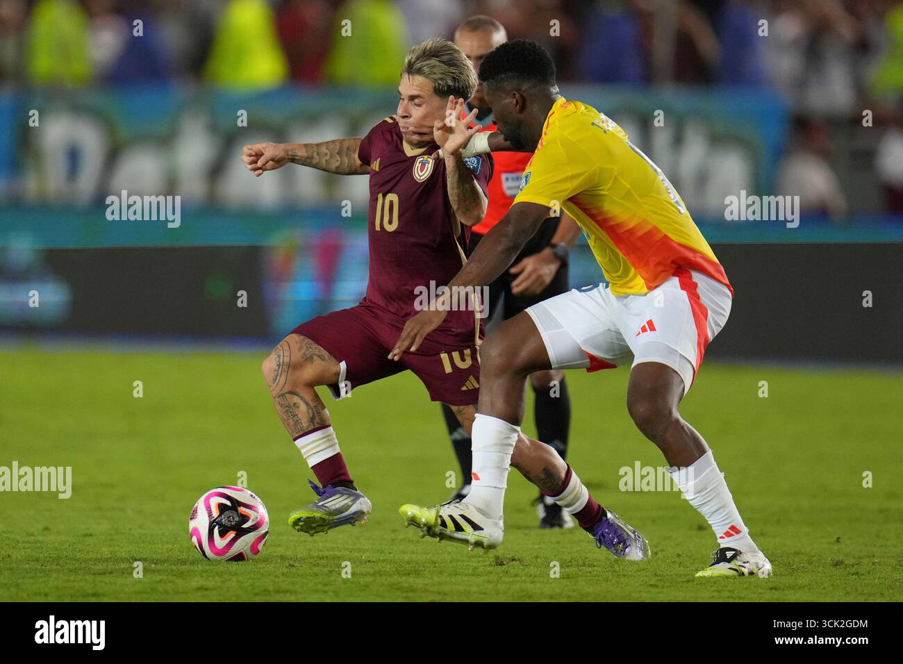 venezuela-s-yeferson-soteldo-dribbles-challenged-by-colombia-s