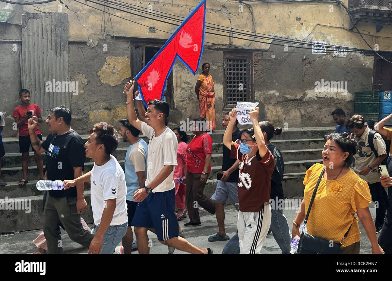 Kathmandu, Nepal. 9th Sep, 2025. Nepali youth chant slogans during a protest rally amid curfew against alleged corruption and government's decision to ban on several social media platforms in Kathmandu, Nepal on September 9, 2025. Credit: ZUMA Press, Inc./Alamy Live News Stock Photo