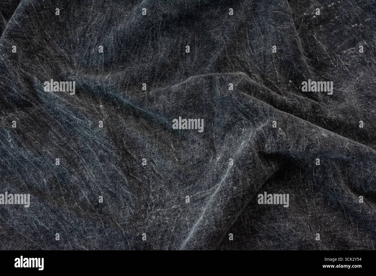Dark bleached fabric wrinkled texture, Bleached cloth background Stock Photo