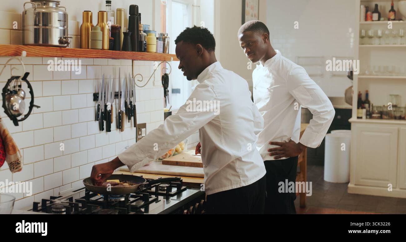 Cooking, instructions and learning with black men in kitchen of home ...