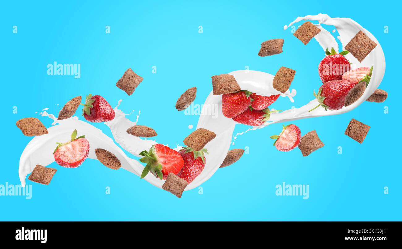 Splashing milk with sweet corn pads and fresh strawberries in air against light blue background. Healthy breakfast Stock Photo