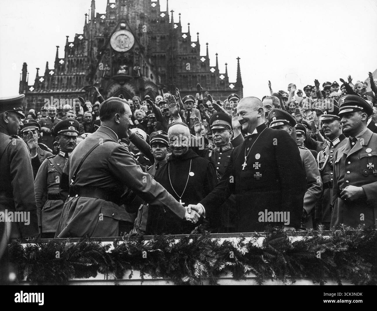 Adolf Hitler shake hands with Reichsbishop Ludwig Muller at the ...