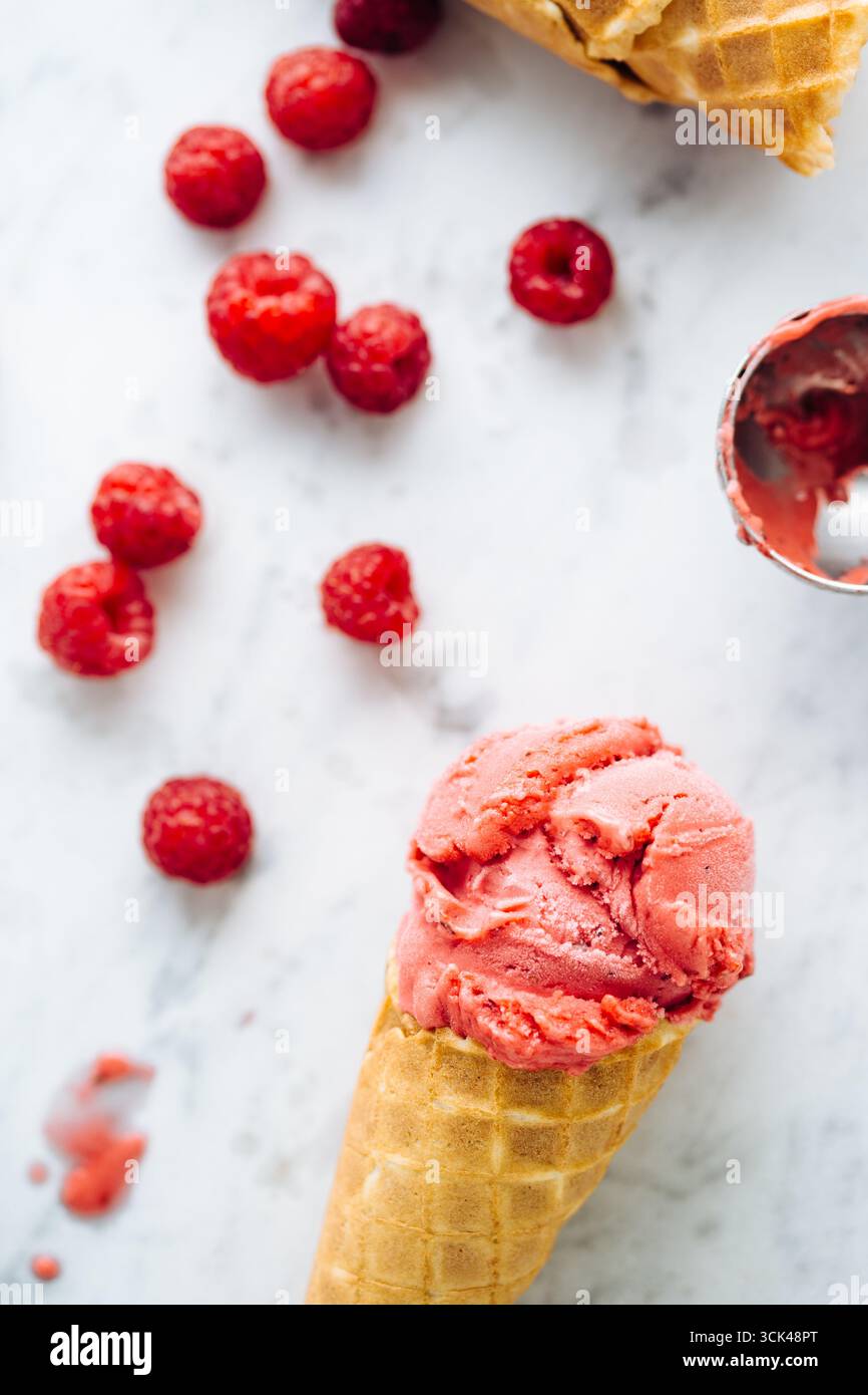 Raspberry ice cream in wafer cones Stock Photo - Alamy
