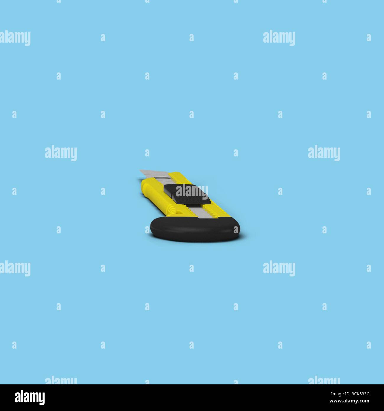 A yellow utility knife with a black handle, designed for cutting and crafting tasks. Stock Photo