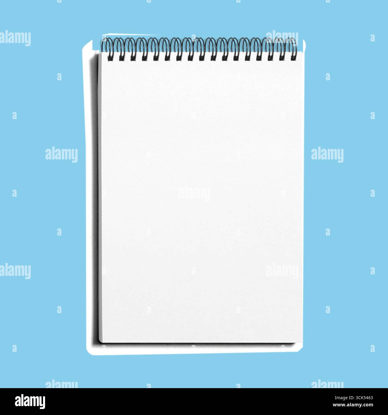 A blank spiral notebook ready for notes, sketches, or creative ideas. Stock Photo