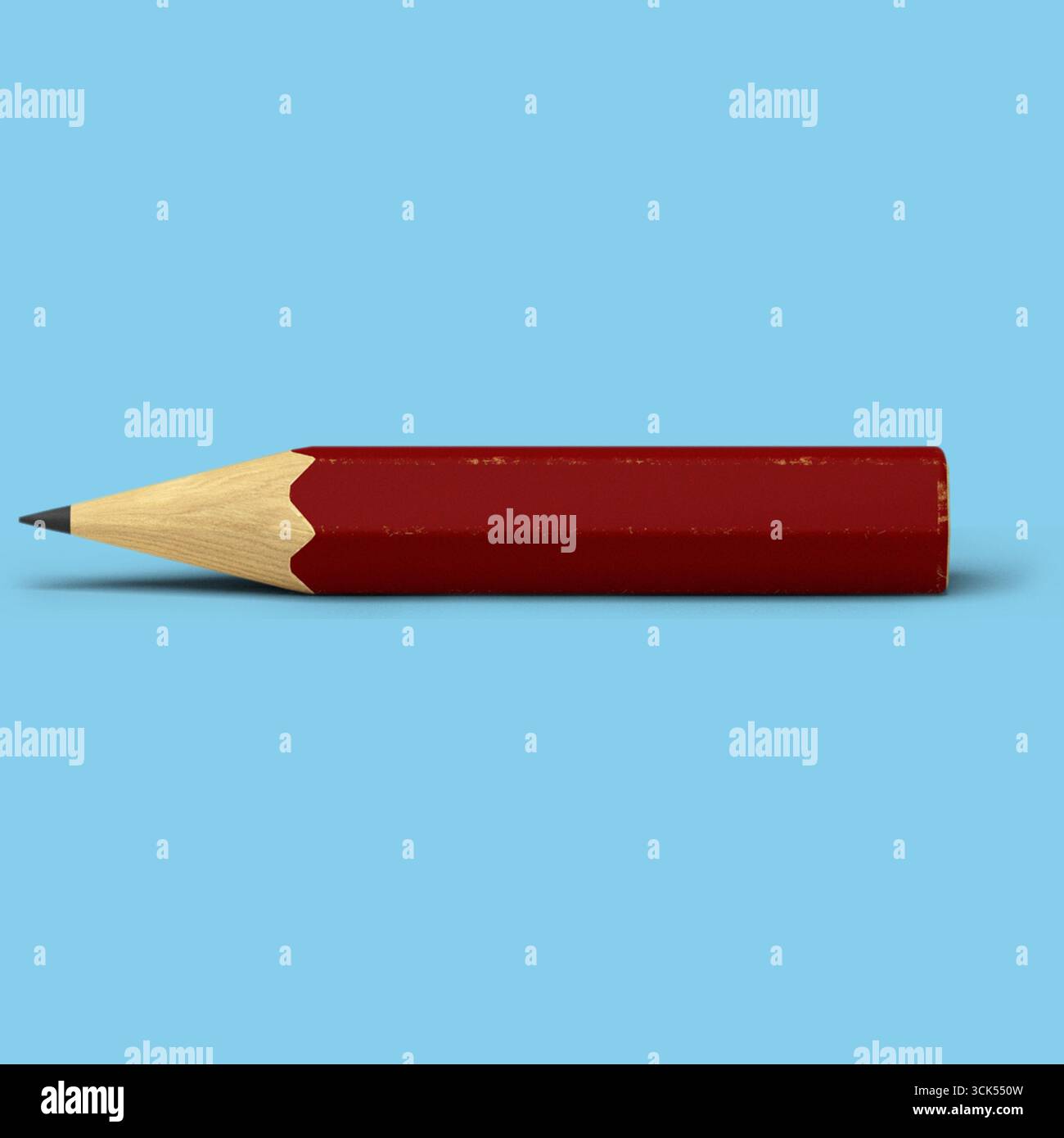 A simple red pencil with a sharpened tip, commonly used for writing or drawing. Stock Photo