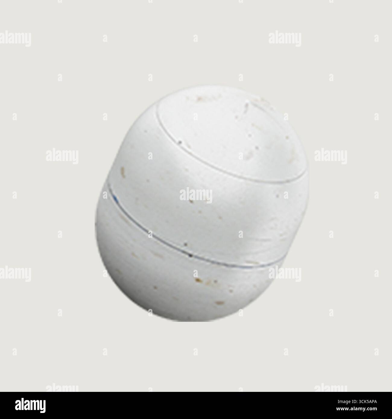 A simple white container with a rounded shape, likely used for storage or packaging. Stock Photo