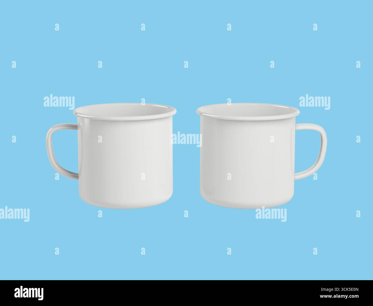 Two simple white mugs with handles, suitable for serving beverages. Stock Photo