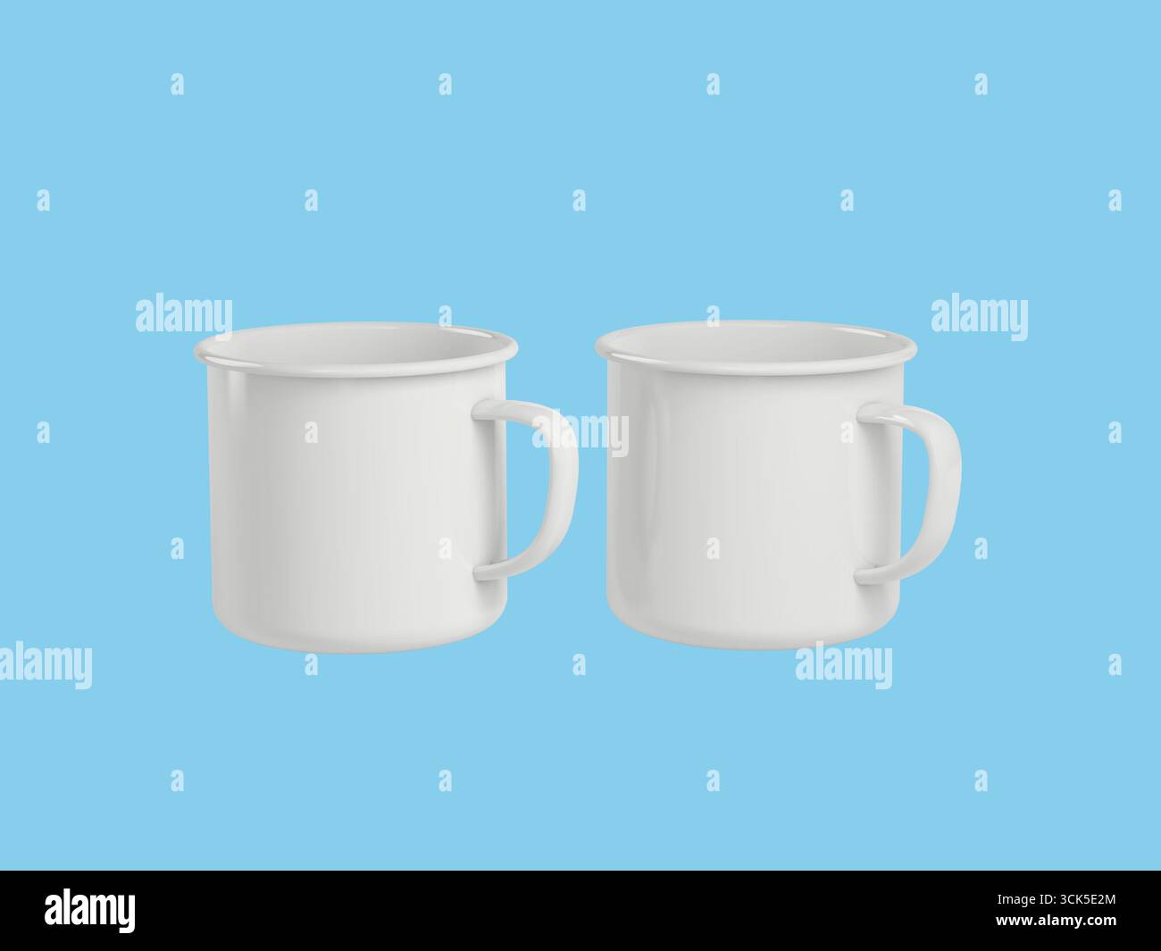Two simple white mugs with handles, suitable for serving beverages. Stock Photo