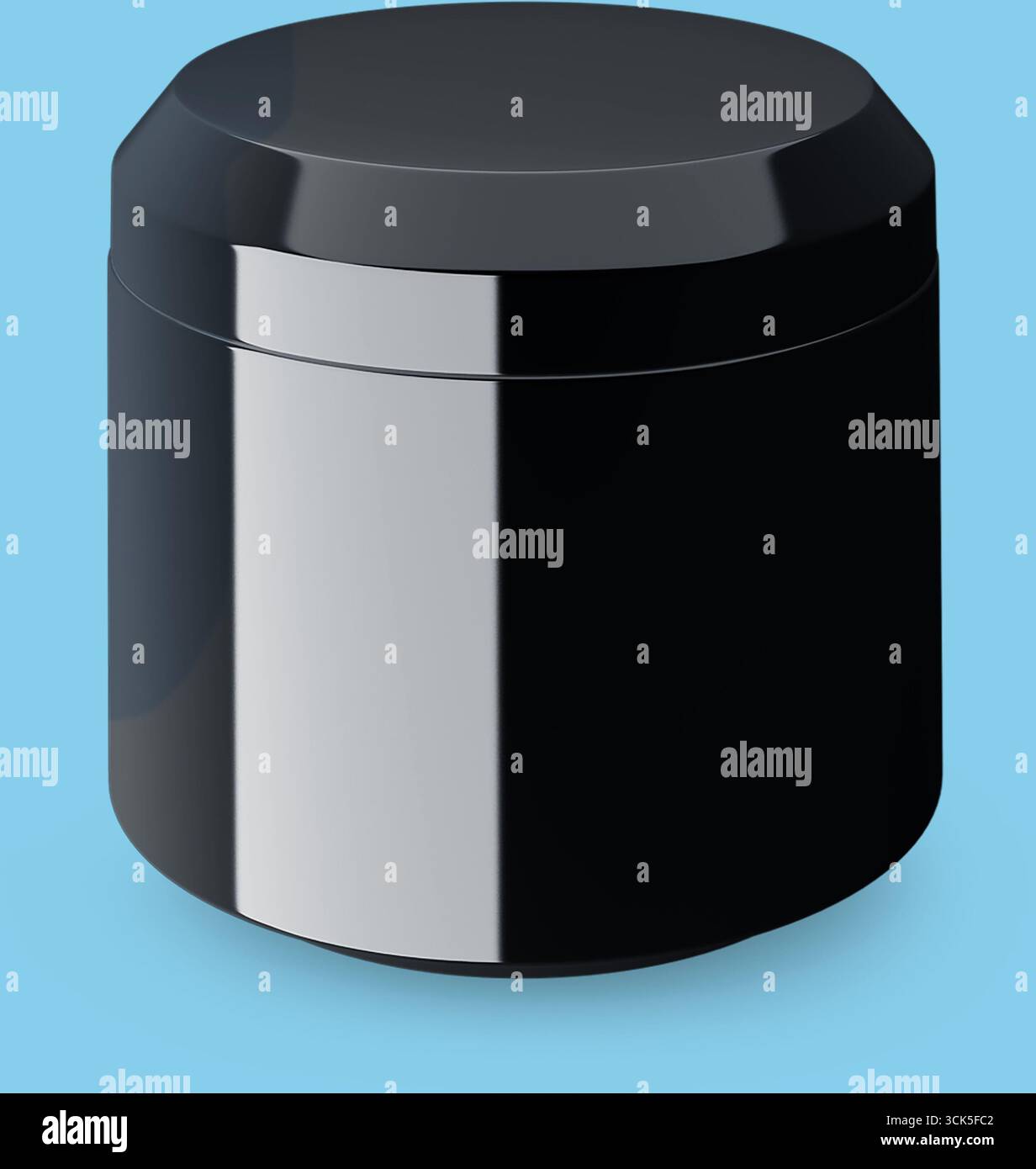 A sleek black container with a smooth surface, likely used for storage or packaging. Stock Photo