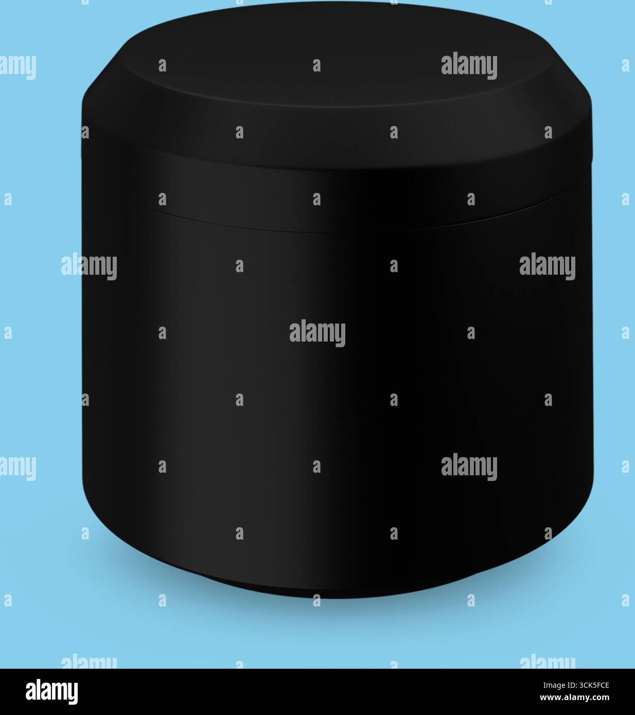A sleek black cylindrical container with a smooth surface, likely used for storage or packaging. Stock Photo
