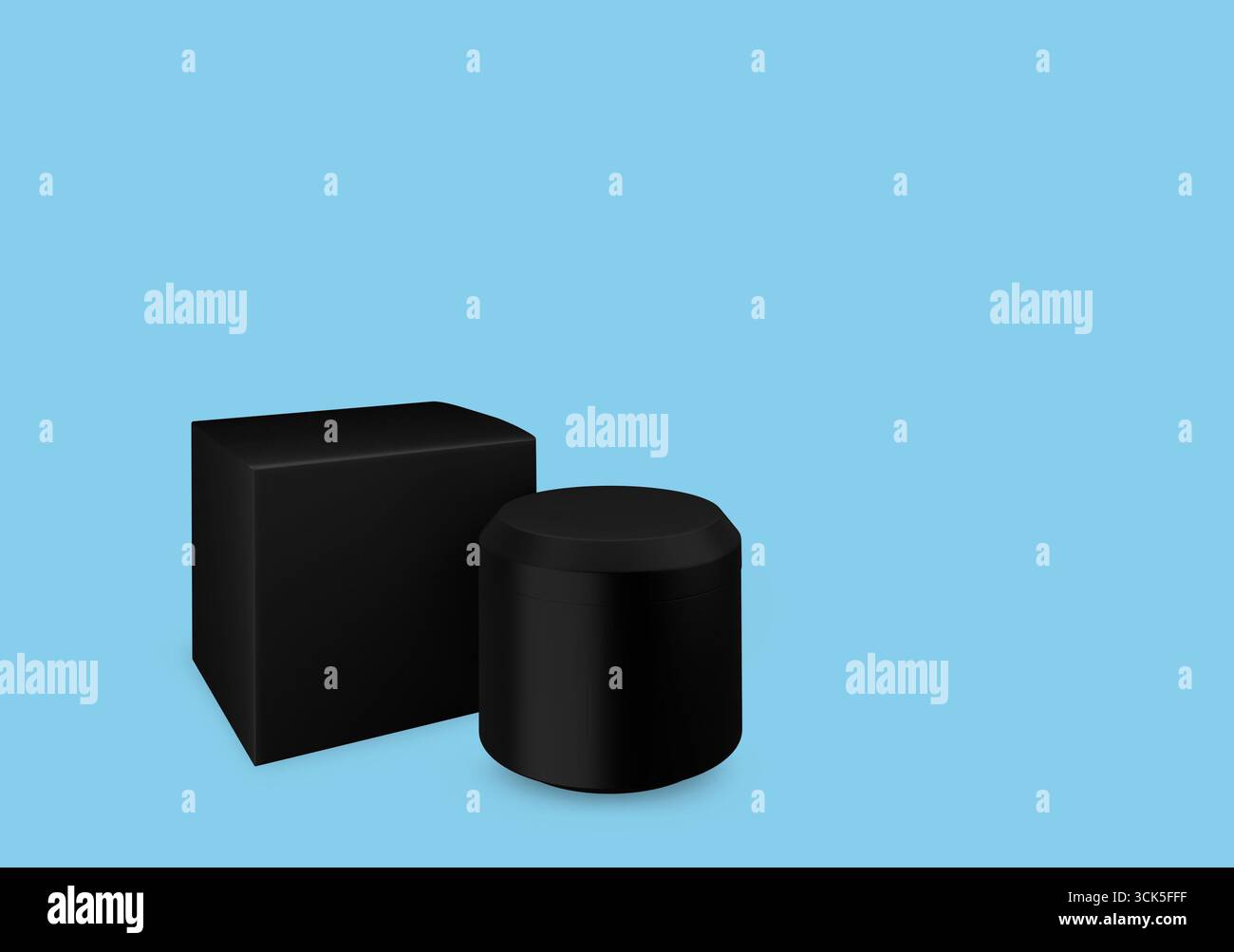 A black cylindrical container next to a black rectangular box, both on a plain background. Stock Photo