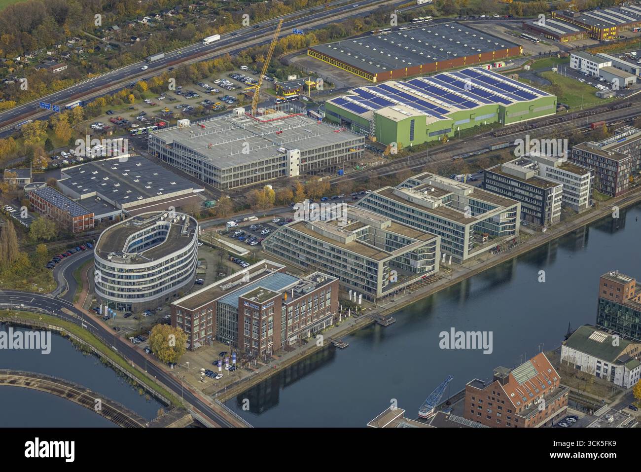 Aerial view, commercial area with construction site and new building ...