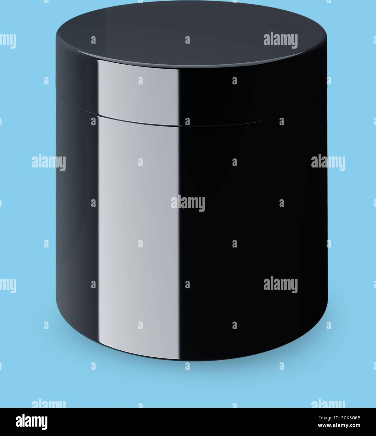 A sleek, black cylindrical container with a smooth surface, likely used for storage or packaging. Stock Photo