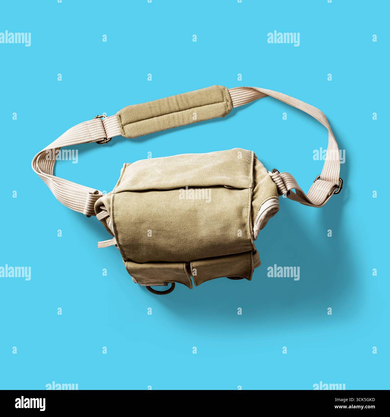 A compact, functional bag designed for carrying essentials, featuring adjustable straps for convenience. Stock Photo