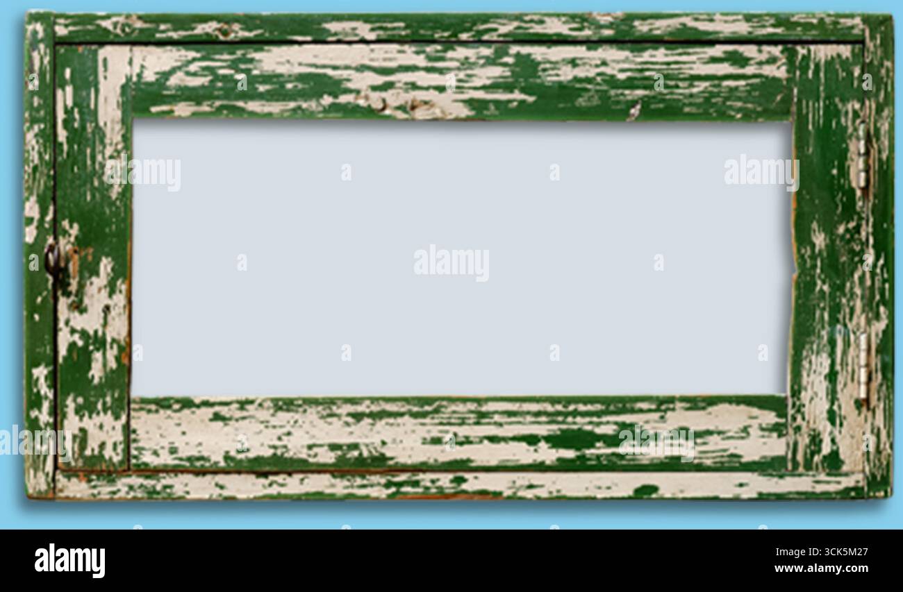 A weathered green wooden frame with a distressed finish, designed to hold a picture or artwork. Stock Photo