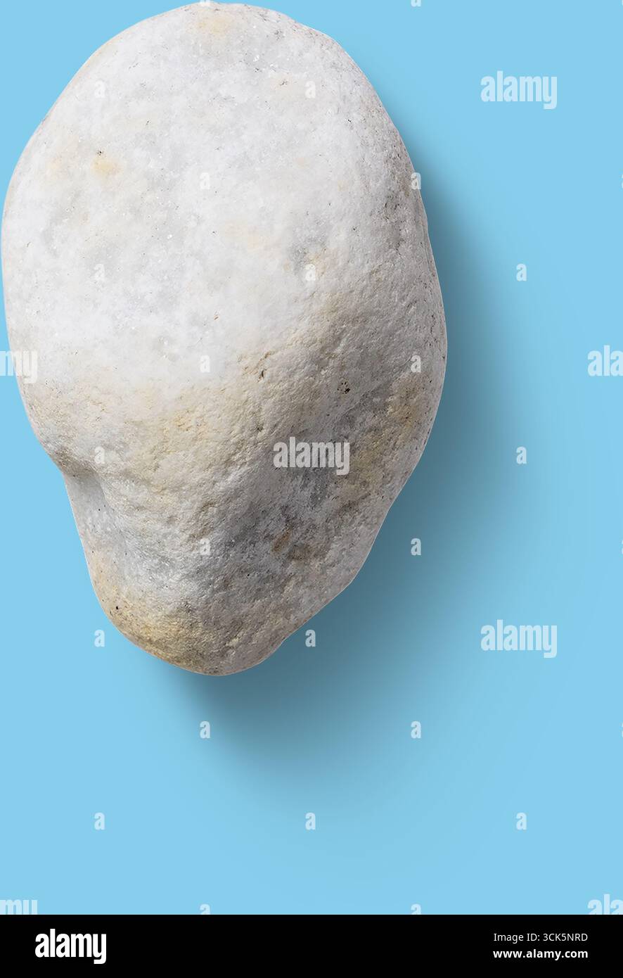 A smooth, rounded stone with a light color, showcasing natural texture ...