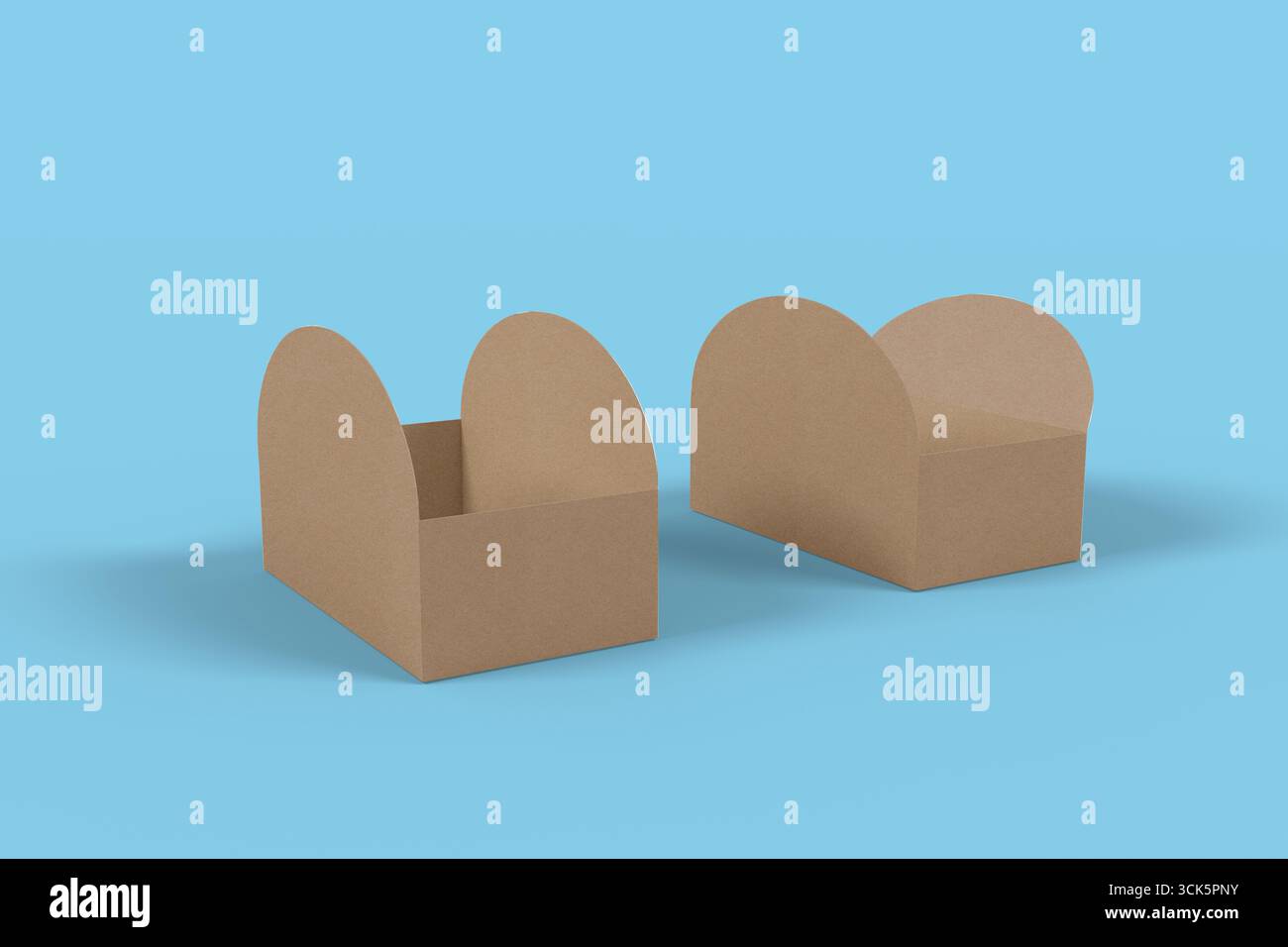 Two brown cardboard boxes with rounded tops, designed for storage or organization. Stock Photo