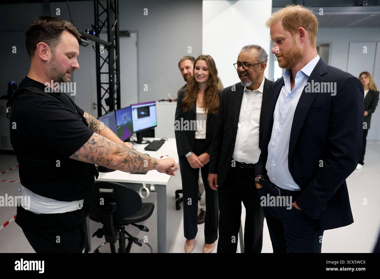 Steve Arnold, who has competed in the Invictus Games, (left) shows his ...