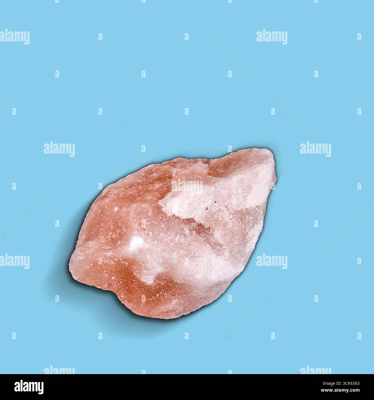 Pink Salt Composition A piece of pink Himalayan salt showcasing its natural crystalline ...