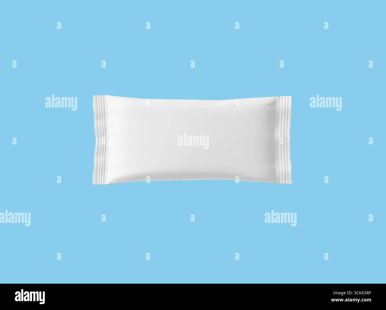 A plain, rectangular white pillow pack, typically used for packaging small items or samples. Stock Photo