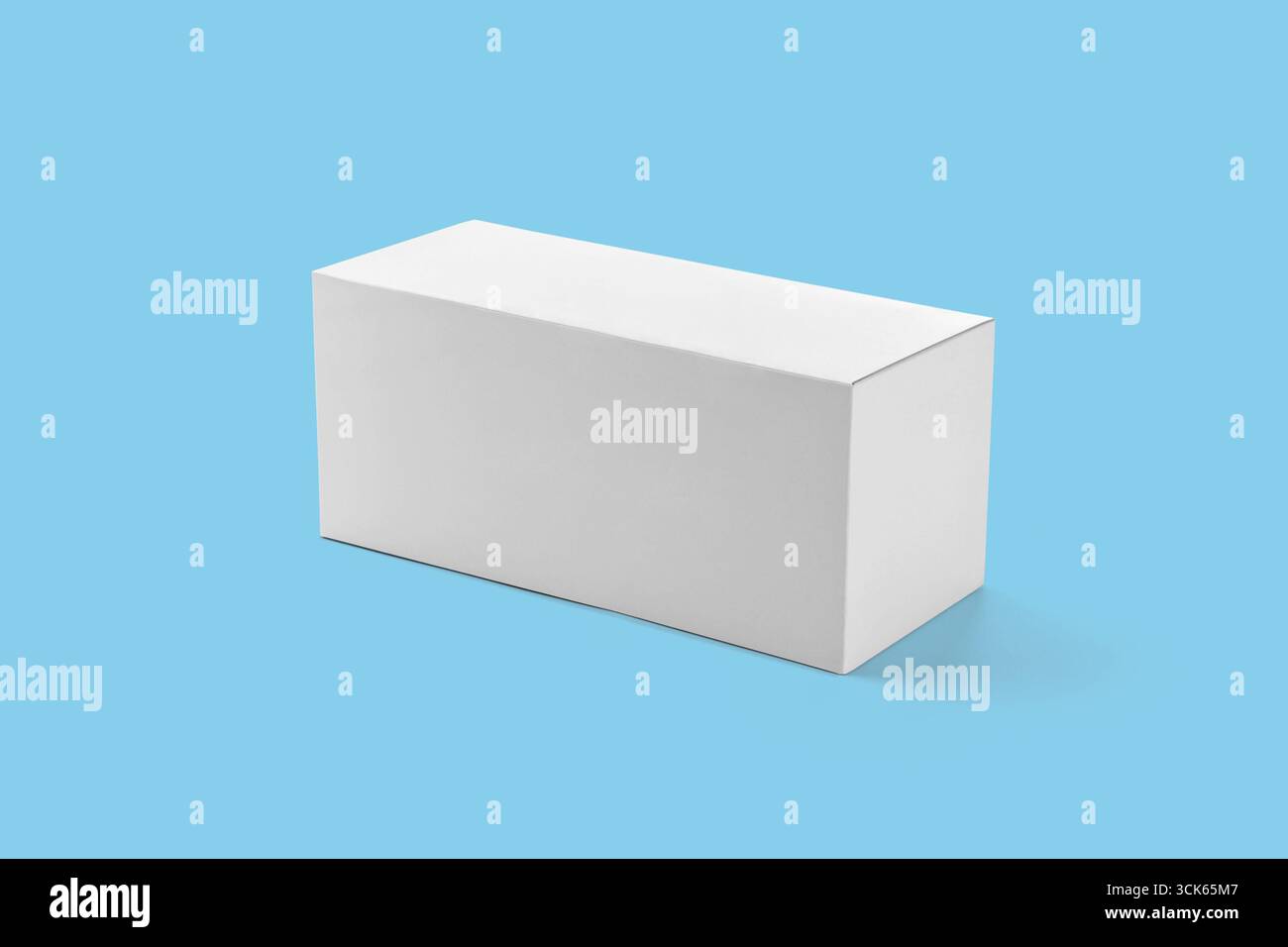 A plain white rectangular box, ideal for packaging or storage purposes. Stock Photo